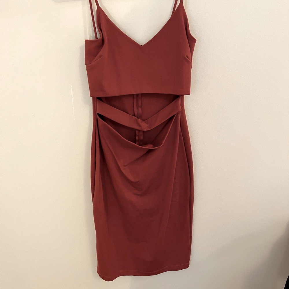Rust colored medium dress that has never been worn.